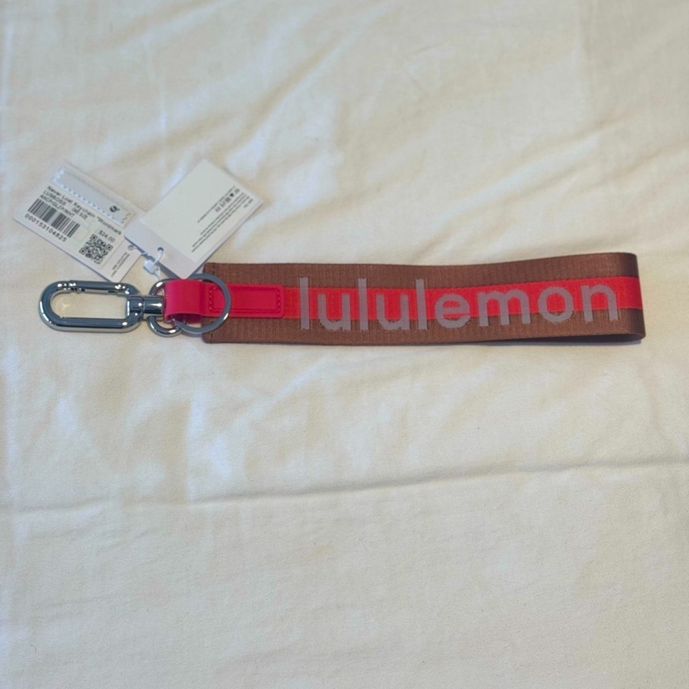 BNWT Lululemon never lost keychain